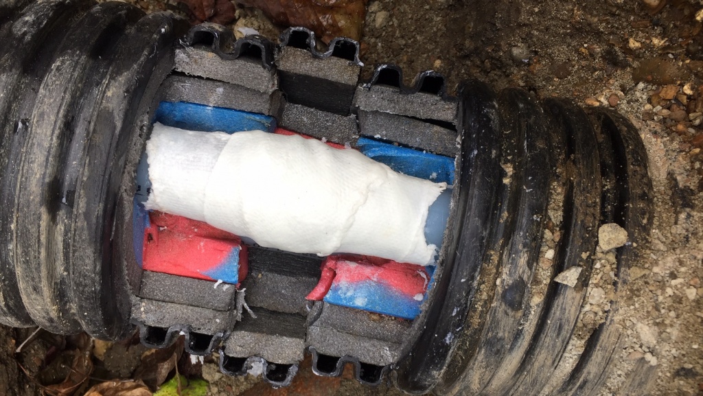 Completed pipe repair of an underground heating pipe at a farm in the UK