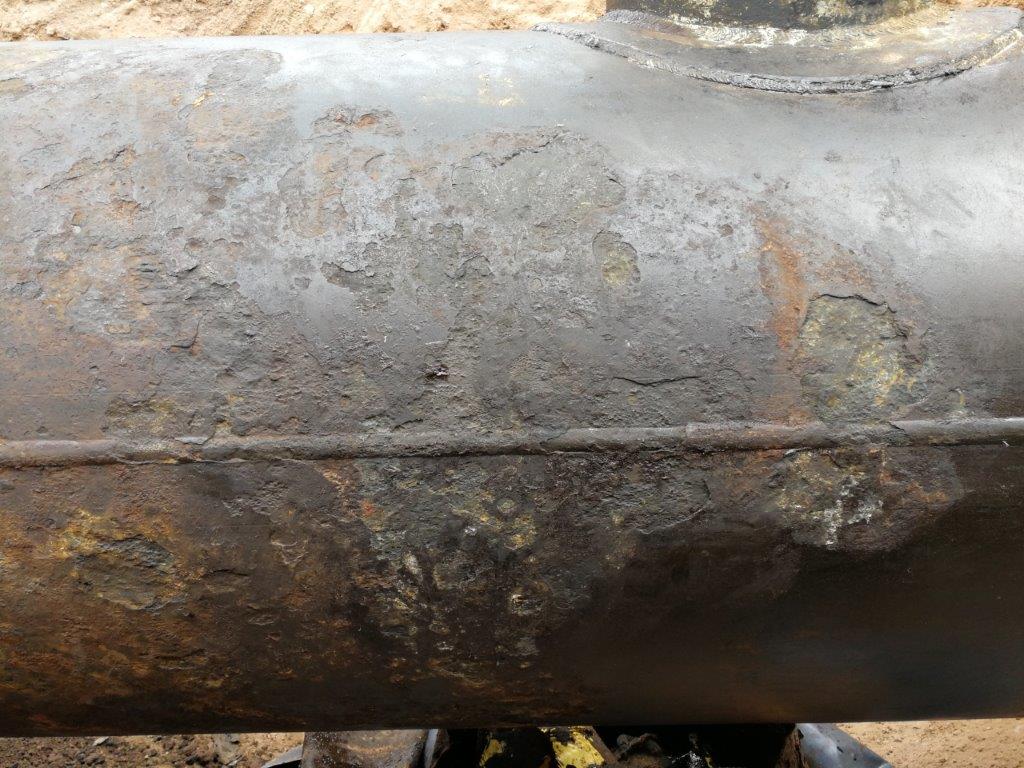 Surface damage to a 900mm steel pipe in an Argent