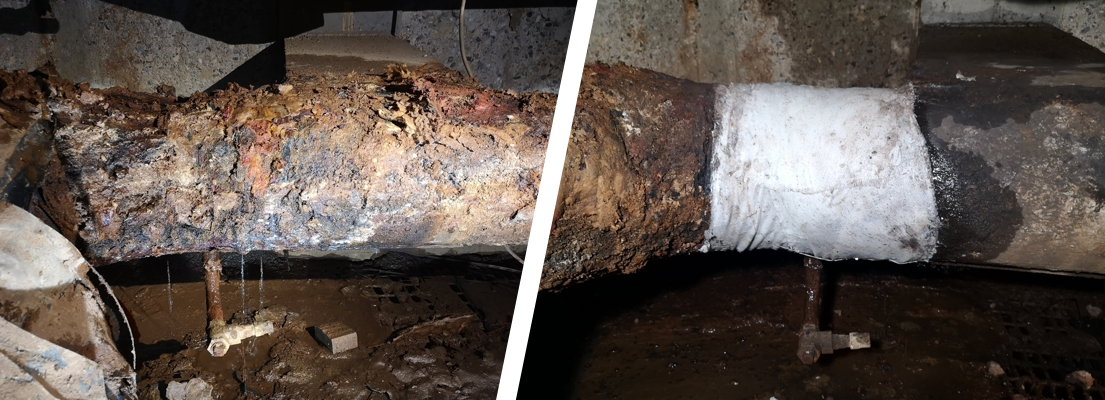 A heavily corroded pipe in a district heating system undergoes a leak repair to keep it operational