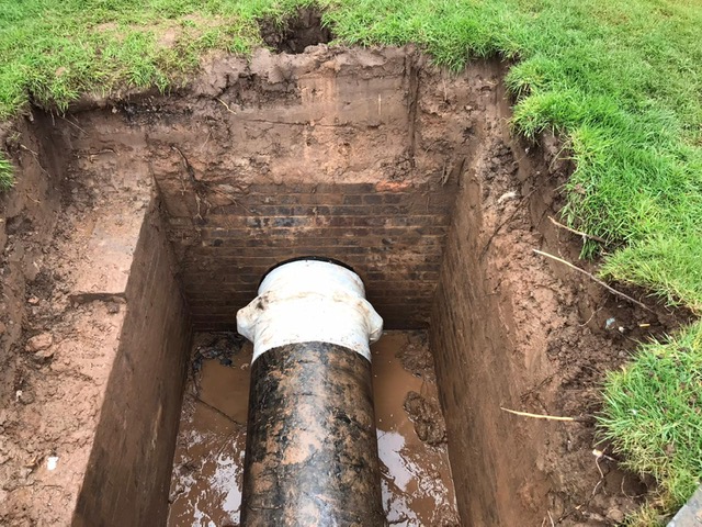 Completed repair of leaking coupling joints on a 650mm pipe in a pit 