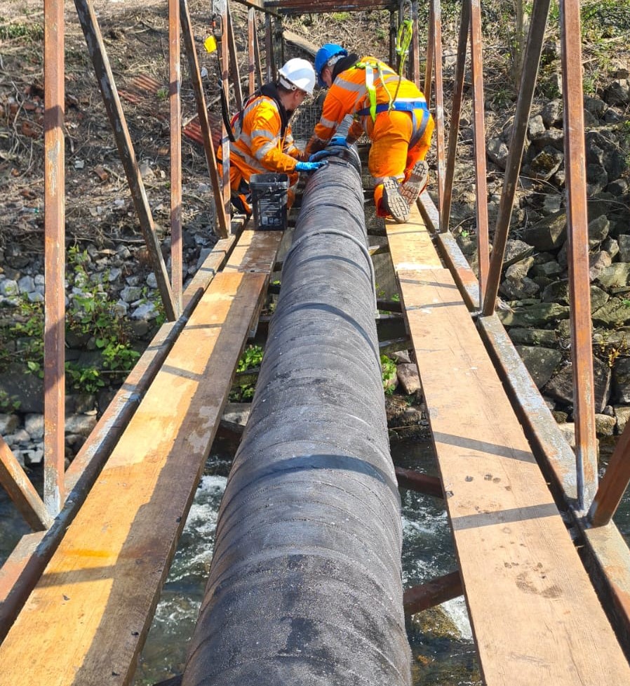 SylWrap CR Corrosion Protection Wrap applied to reinforce and repair a gravity fed pipe bridge in South Wales