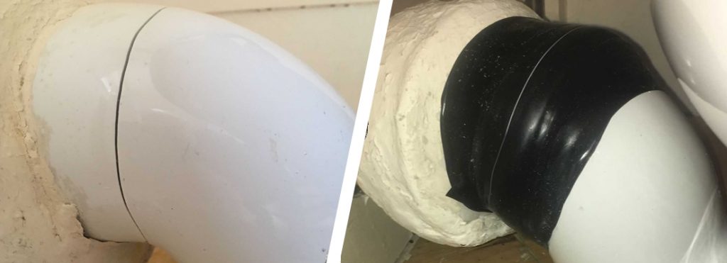 A hairline crack in porcelain toilet soil pipe having undergone repair with Wrap & Seal Pipe Burst Tape