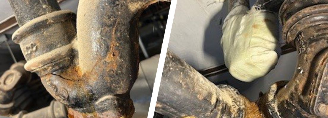 Hairline crack in a cast iron waste pipe U-bend undergoes repair with a SylWrap Drain & Waste Pipe Repair Kit at a UK hospital