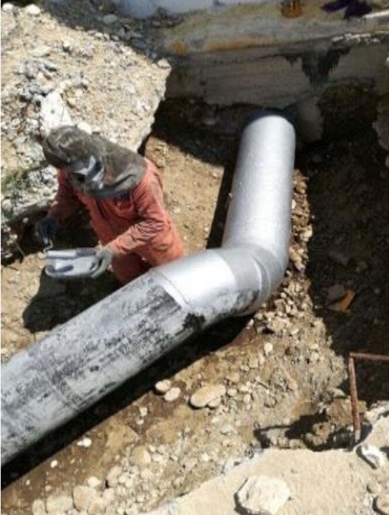Liquid Metal Epoxy Coating painted onto a 300mm diameter steel pipe in a repair programme at a wastewater treatment plant in Mexico