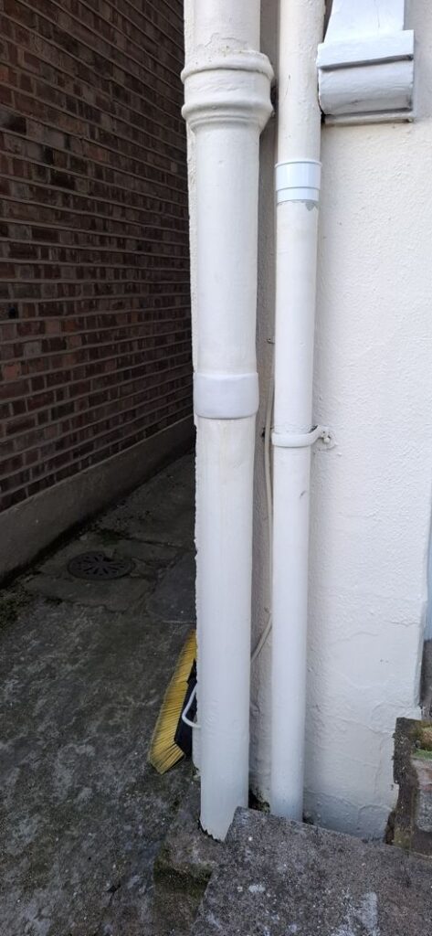 An imitation pipe sleeve fitting created with AB Original Epoxy Putty to disguise the repair of a crack in a soil vent pipe